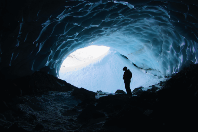 Man entering cave